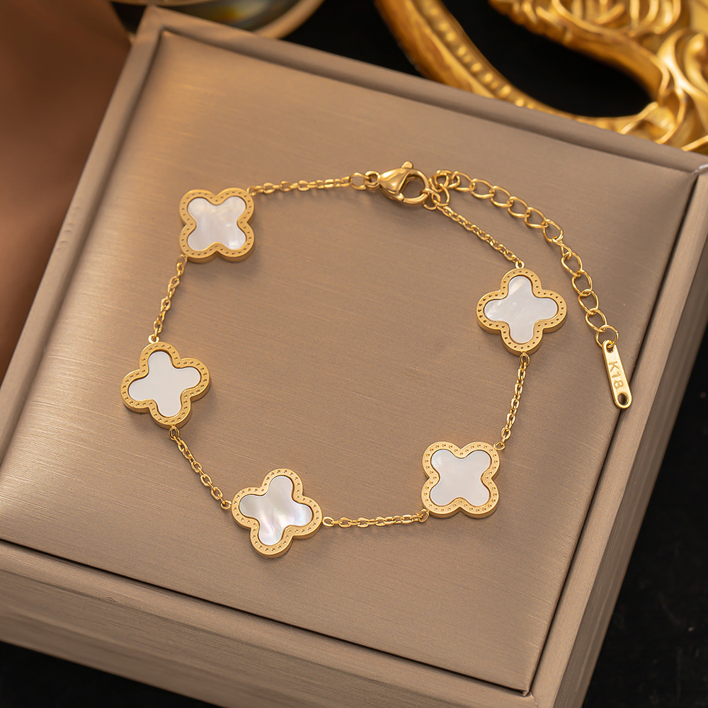 Weißes vierblättriges Kleeblatt goldenes vielseitiges Ins-Stil-Mode-Handaccessoire