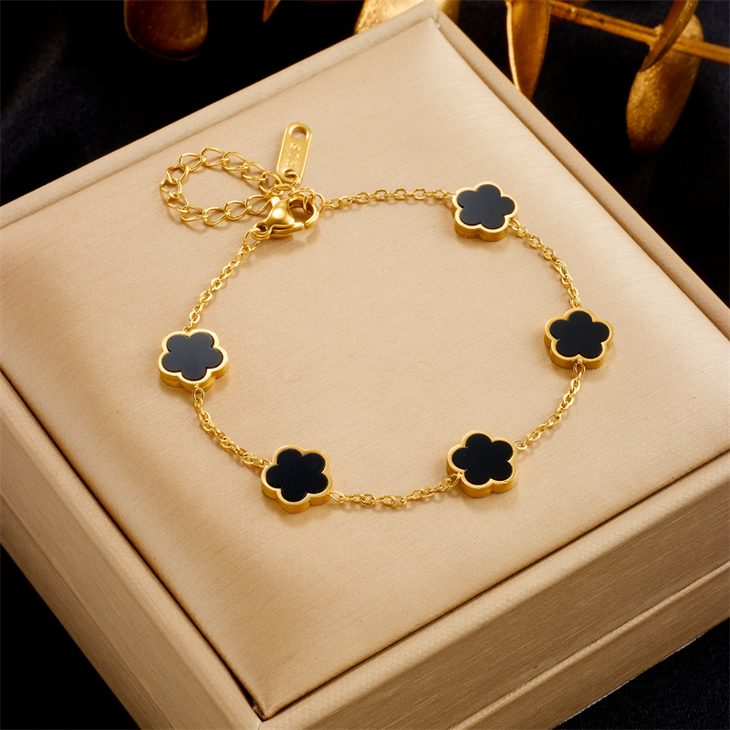 Pulsera de moda estilo ins trébol de cinco hojas negro versátil